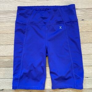 Quick-Dri Girls Purple spandex athletic shorts with pockets.  Size 10.